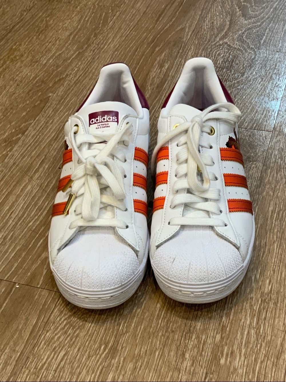 adidas White Sneakers with Orange Stripes and Maroon Accents
